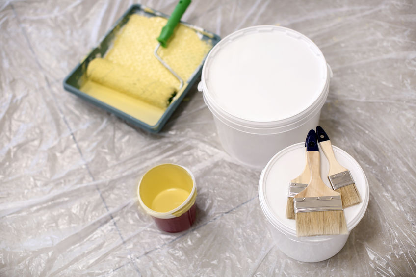 Buckets with paint and brushes indoors indoors